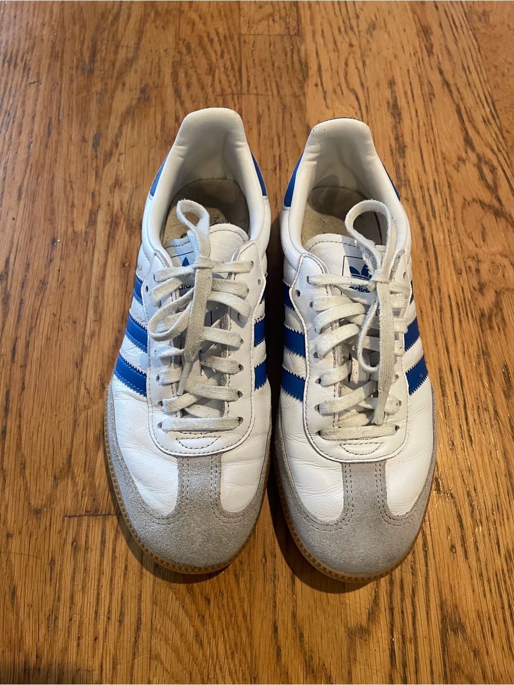 Adidas Samba OG sneakers in white with blue stripes